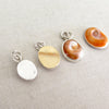 Fisherman's shell charm in silver or gold