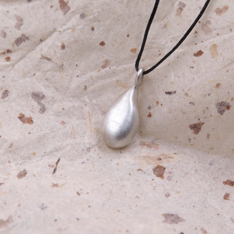 Liquid Drop Charm in Bronze/Silver - Alkisti Jewelry