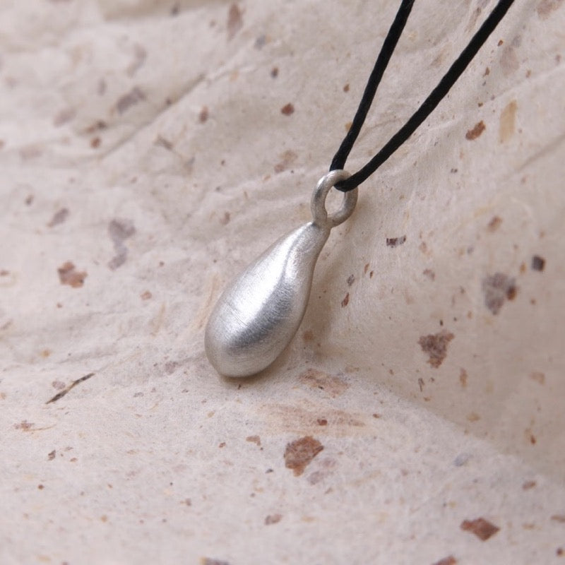 Liquid Drop Charm in Bronze/Silver - Alkisti Jewelry