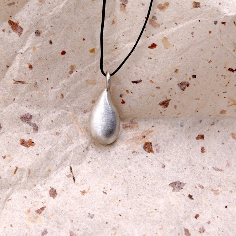 Liquid Drop Charm in Bronze/Silver - Alkisti Jewelry